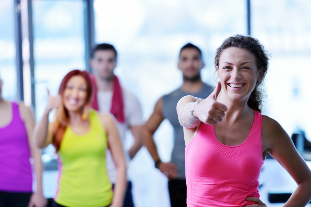 Group of people exercising at the gym